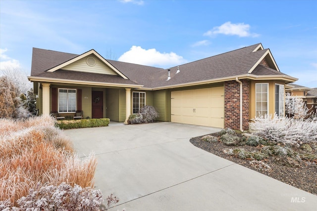 ranch-style home featuring a garage