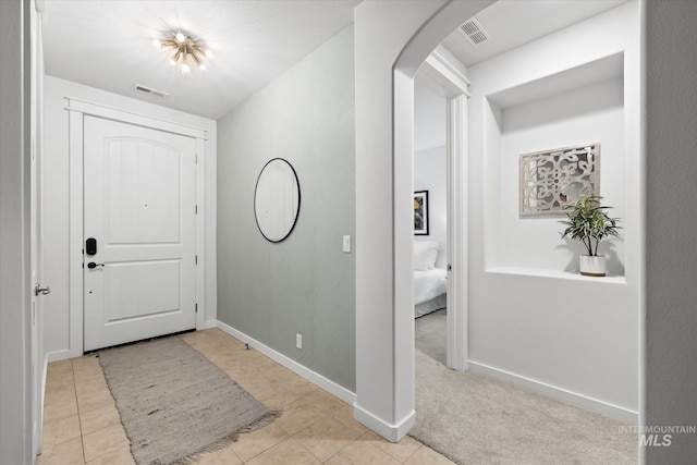 view of tiled foyer entrance