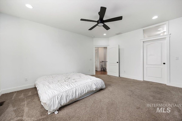 bedroom featuring baseboards, visible vents, dark colored carpet, and recessed lighting