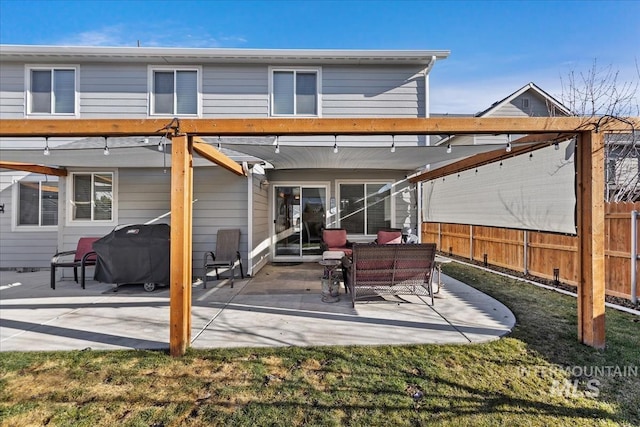 rear view of house featuring a patio