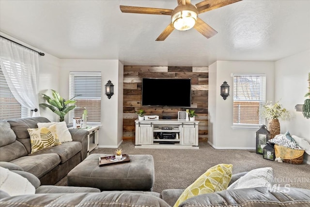 living room featuring light carpet and ceiling fan