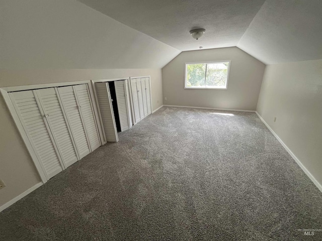 909 E 6th, Moscow, ID 83843 - bonus room with carpet flooring, lofted ceiling, and baseboards