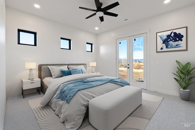 carpeted bedroom featuring recessed lighting, french doors, visible vents, and access to exterior