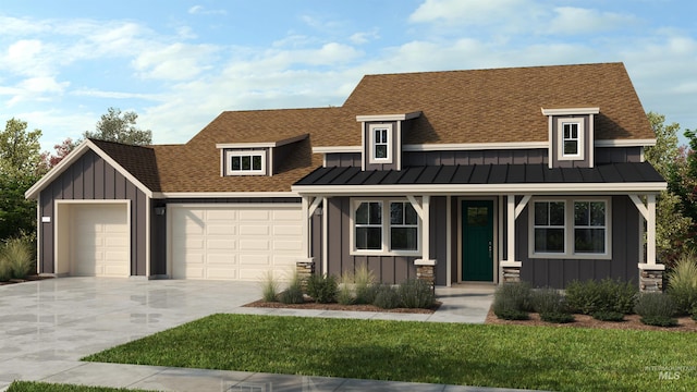 277 Maxine Ln W Lot 505, Kimberly, ID 83341 - view of front of house featuring board and batten siding, an attached garage, a standing seam roof, concrete driveway, and a shingled roof