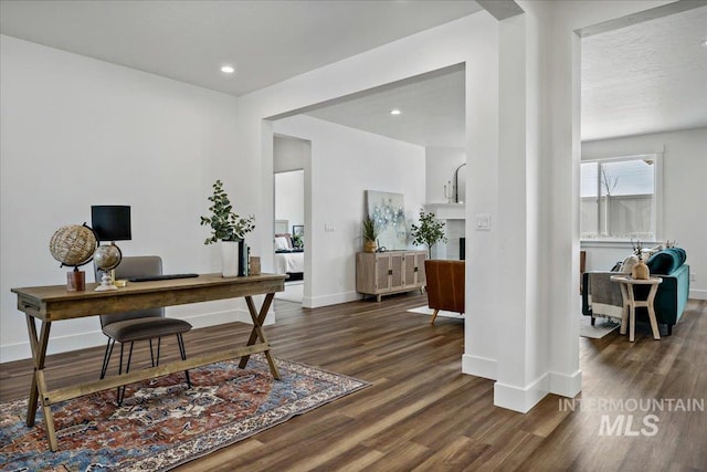 office with baseboards, recessed lighting, and dark wood-style flooring