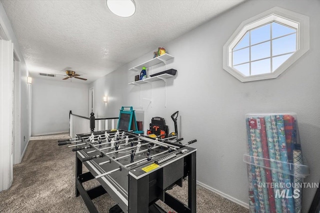 408 Tanoak Cir, Nampa, ID 83686 - game room featuring visible vents, carpet floors, baseboards, a textured ceiling, and ceiling fan