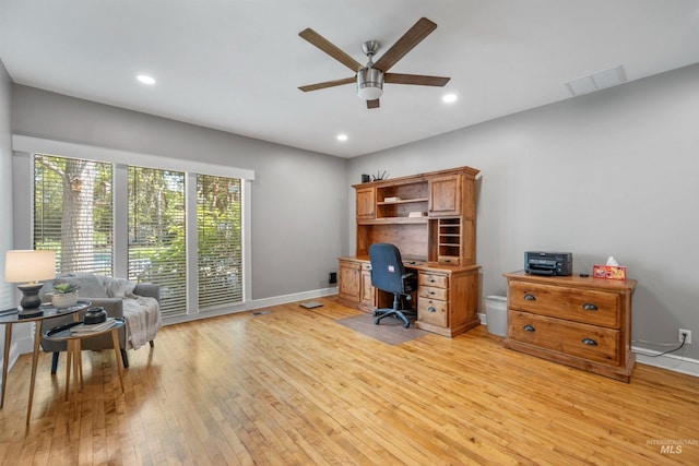 office area with light wood-style flooring, a ceiling fan, recessed lighting, and baseboards