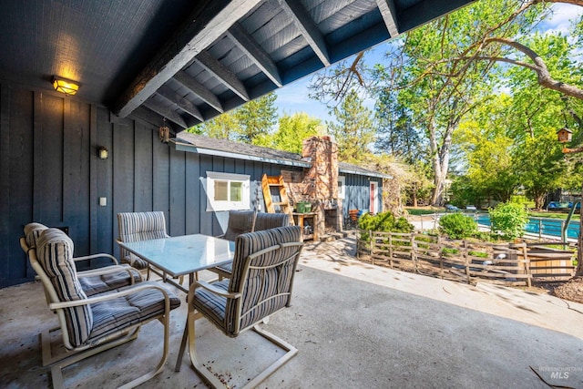 view of patio with outdoor dining area