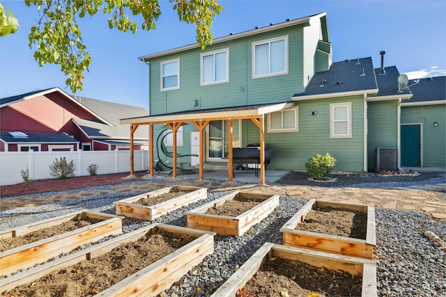 rear view of house featuring a patio