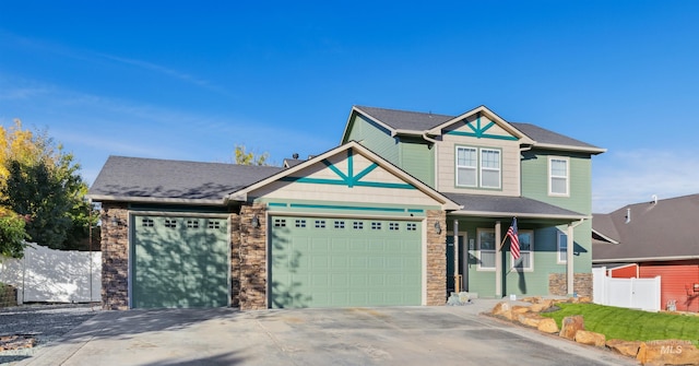 craftsman inspired home featuring a garage