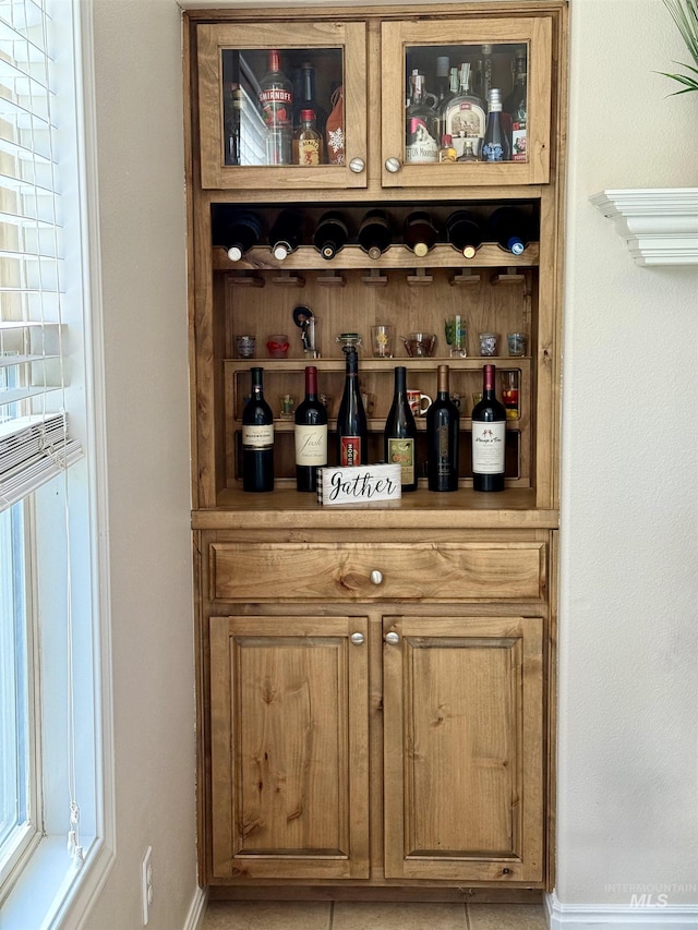bar featuring baseboards