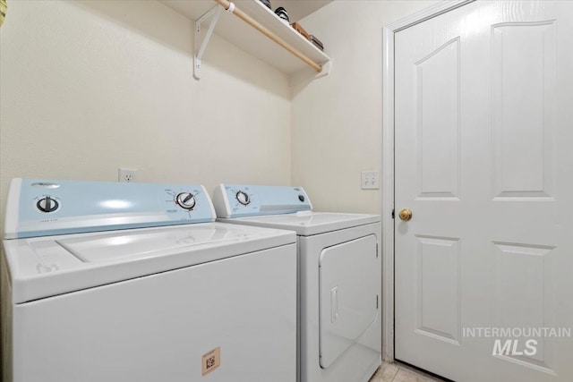 laundry area featuring independent washer and dryer