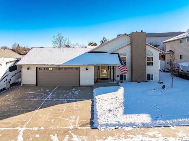 view of front of property featuring a garage