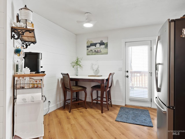 dining room featuring ceiling fan and light wood-type flooring