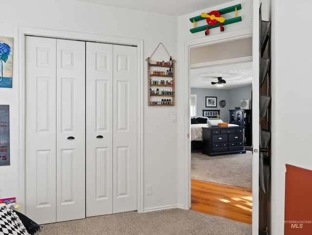 carpeted bedroom featuring a closet