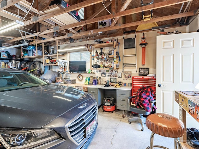 garage featuring a workshop area