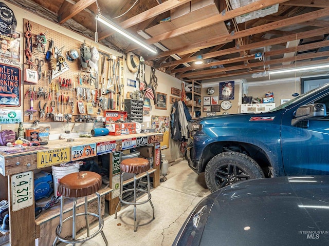 garage featuring a workshop area