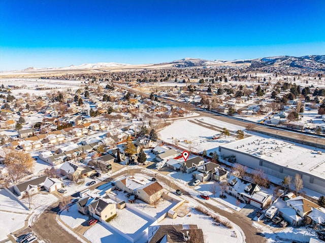 birds eye view of property with a mountain view