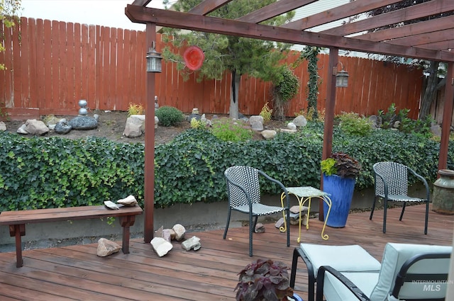 wooden terrace featuring a pergola