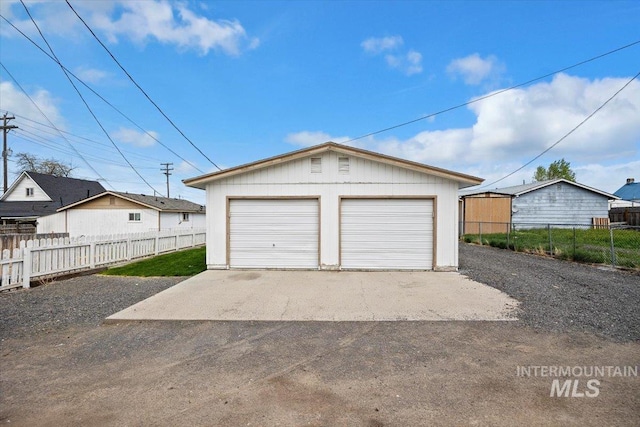 detached garage with fence