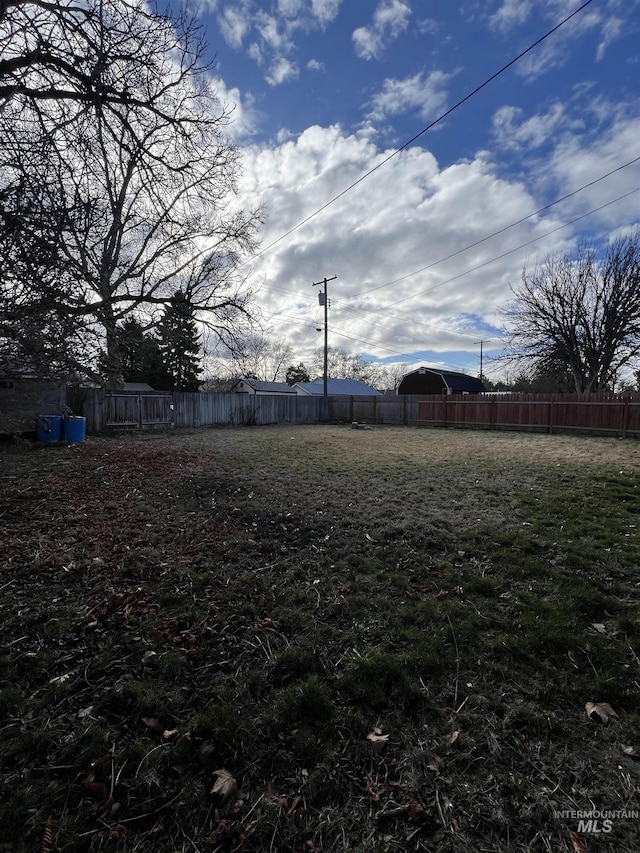 view of yard with fence