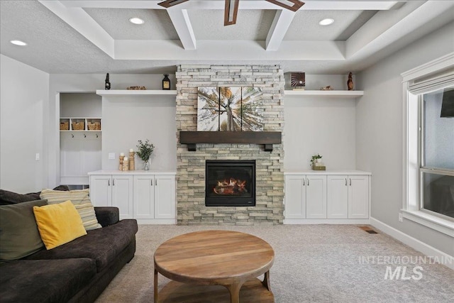 1753 S Kimball Way, Boise, ID 83709 - living room featuring carpet, a fireplace, beamed ceiling, baseboards, and recessed lighting