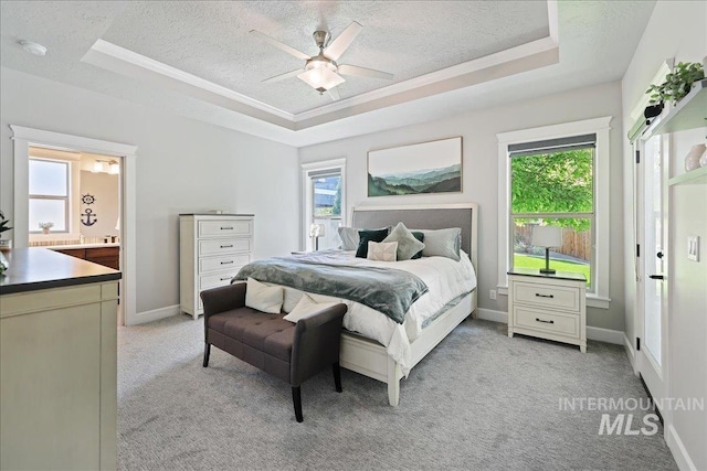 1753 S Kimball Way, Boise, ID 83709 - bedroom featuring a raised ceiling, a textured ceiling, light colored carpet, ornamental molding, and ceiling fan