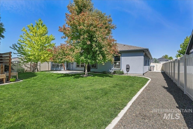 1753 S Kimball Way, Boise, ID 83709 - back of house with stucco siding and roof with shingles