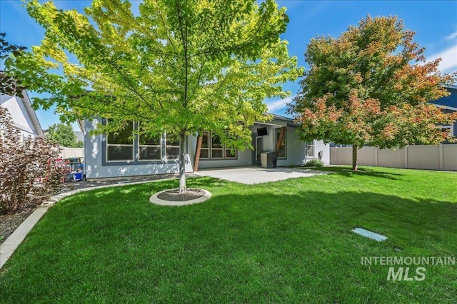 1753 S Kimball Way, Boise, ID 83709 - back of house with a patio area and stucco siding