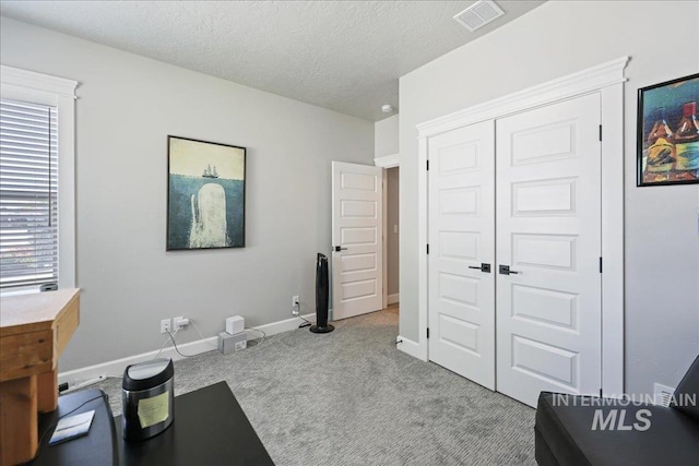1753 S Kimball Way, Boise, ID 83709 - carpeted home office with baseboards and a textured ceiling