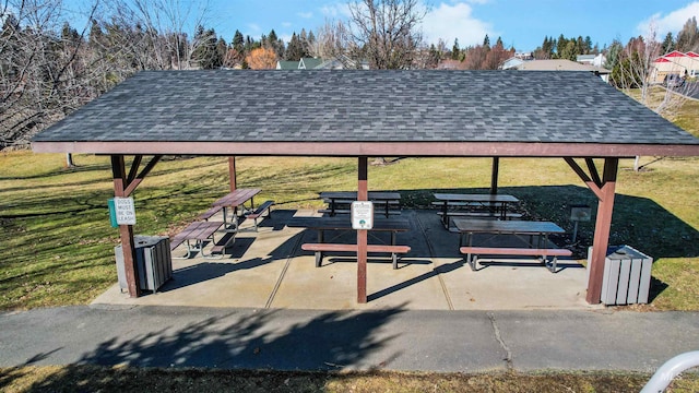 view of property's community with a yard and a gazebo