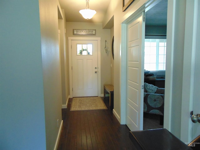 983 S St, Vale, OR 97918 - entryway with dark wood-type flooring and baseboards