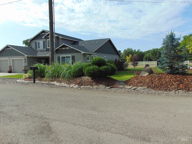 983 S St, Vale, OR 97918 - view of front facade featuring concrete driveway and an attached garage
