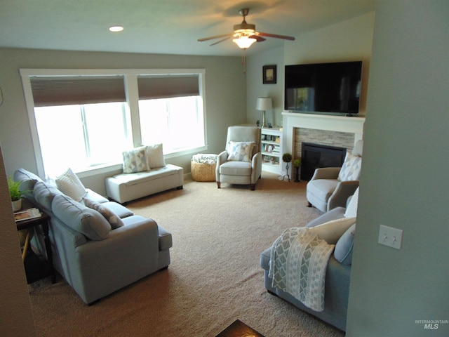 983 S St, Vale, OR 97918 - carpeted living room featuring a ceiling fan and a stone fireplace