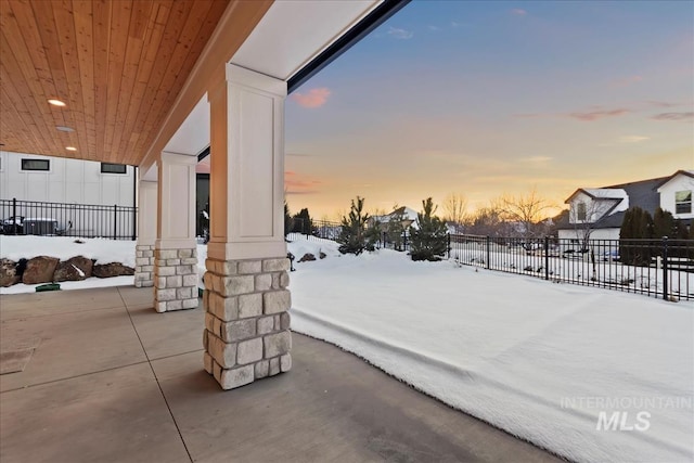 view of snow covered patio