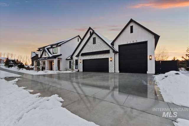 modern farmhouse featuring a garage