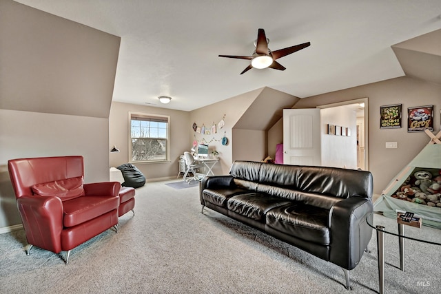 carpeted living room featuring ceiling fan and vaulted ceiling