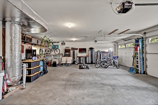 garage featuring a garage door opener