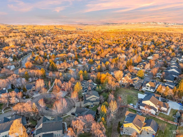 aerial view at dusk with a mountain view