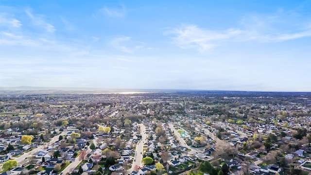 aerial view of property's location featuring nearby suburban area