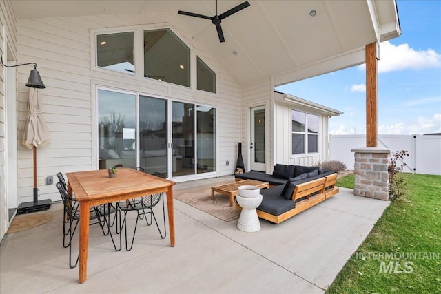 view of patio / terrace featuring fence and an outdoor living space