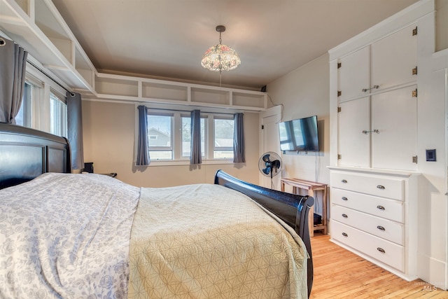 bedroom with light wood-style flooring