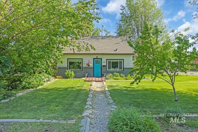 1315 E Lincoln Ave, Nampa, ID 83686 - view of front of home with brick siding and a front lawn