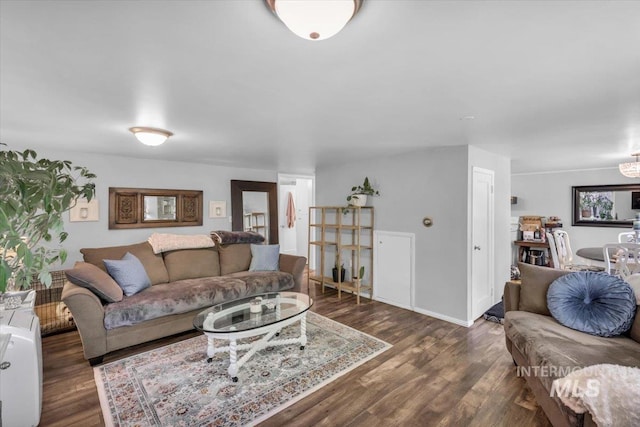 1315 E Lincoln Ave, Nampa, ID 83686 - living room with wood finished floors and baseboards
