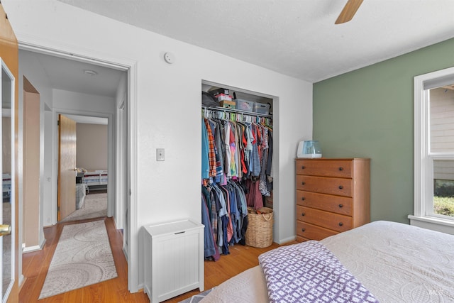 403 29th, Lewiston, ID 83501 - bedroom with wood finished floors, a closet, ceiling fan, and baseboards