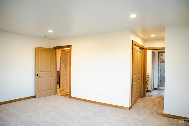 spare room featuring carpet floors