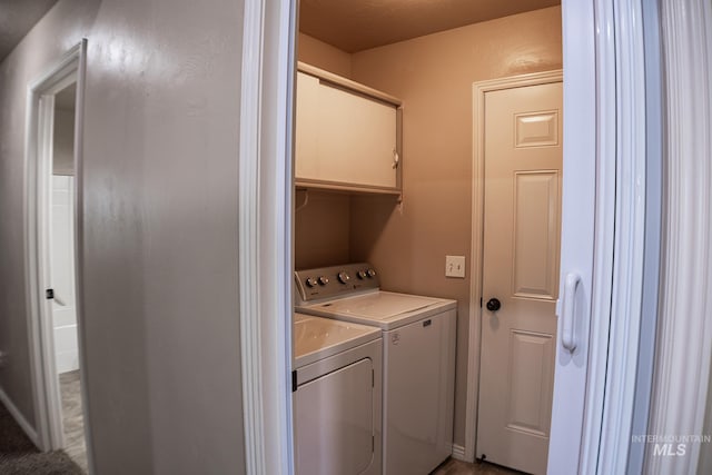 1155 Caswell Ave W, Twin Falls, ID 83301 - laundry area with cabinet space and washing machine and clothes dryer
