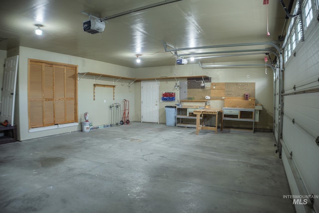 1155 Caswell Ave W, Twin Falls, ID 83301 - garage with a garage door opener and a workshop area