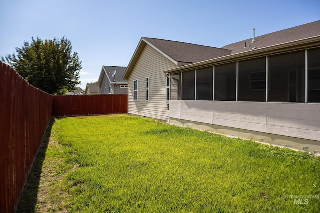 1155 Caswell Ave W, Twin Falls, ID 83301 - fenced backyard with a sunroom