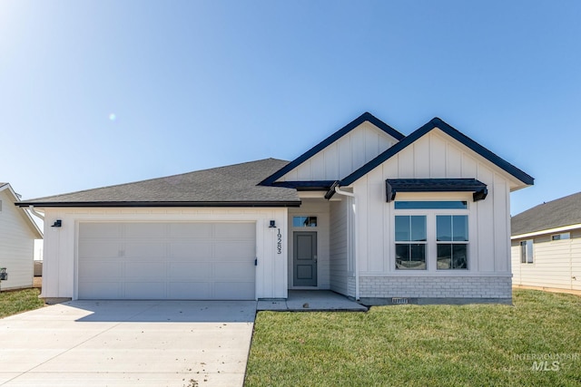 modern farmhouse with a garage, a front lawn, board and batten siding, and driveway